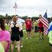 RWB runner and South Lyon resident Matt Spivey holds an American flag before the start of the Dexter-Ann Arbor half marathon on Sunday, June 2. Daniel Brenner I AnnArbor.com